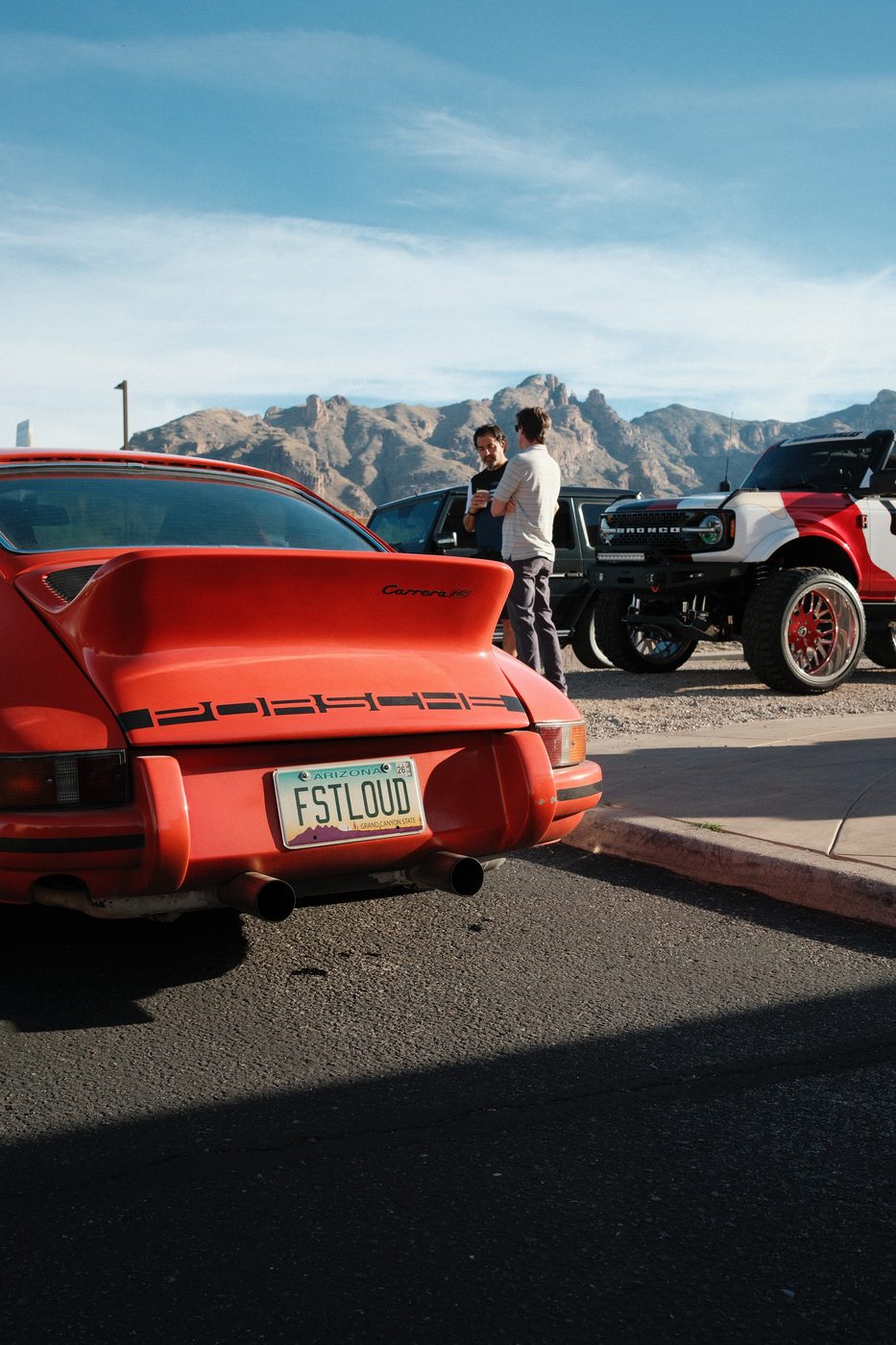 Porsche Carrera RS with desert mountains behind